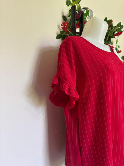 Maglia righe con volant