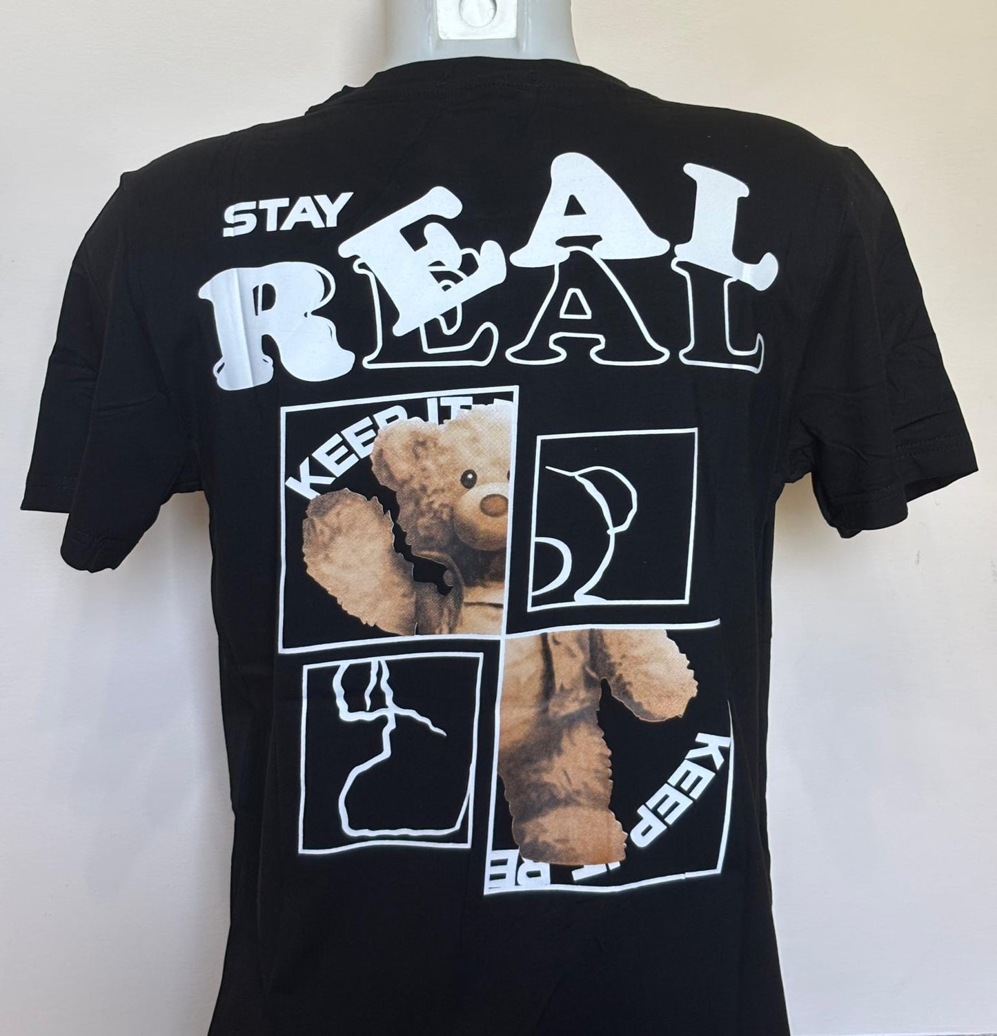 T-shirt scritta "REAL"
